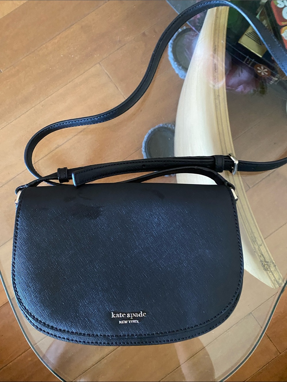 kate spade black crossbody saddle-style bag